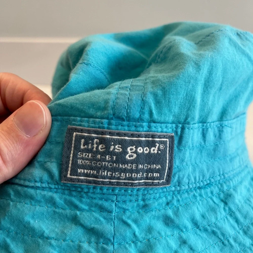 - Life is good reversible 100% cotton kids bucket hat yellow blue